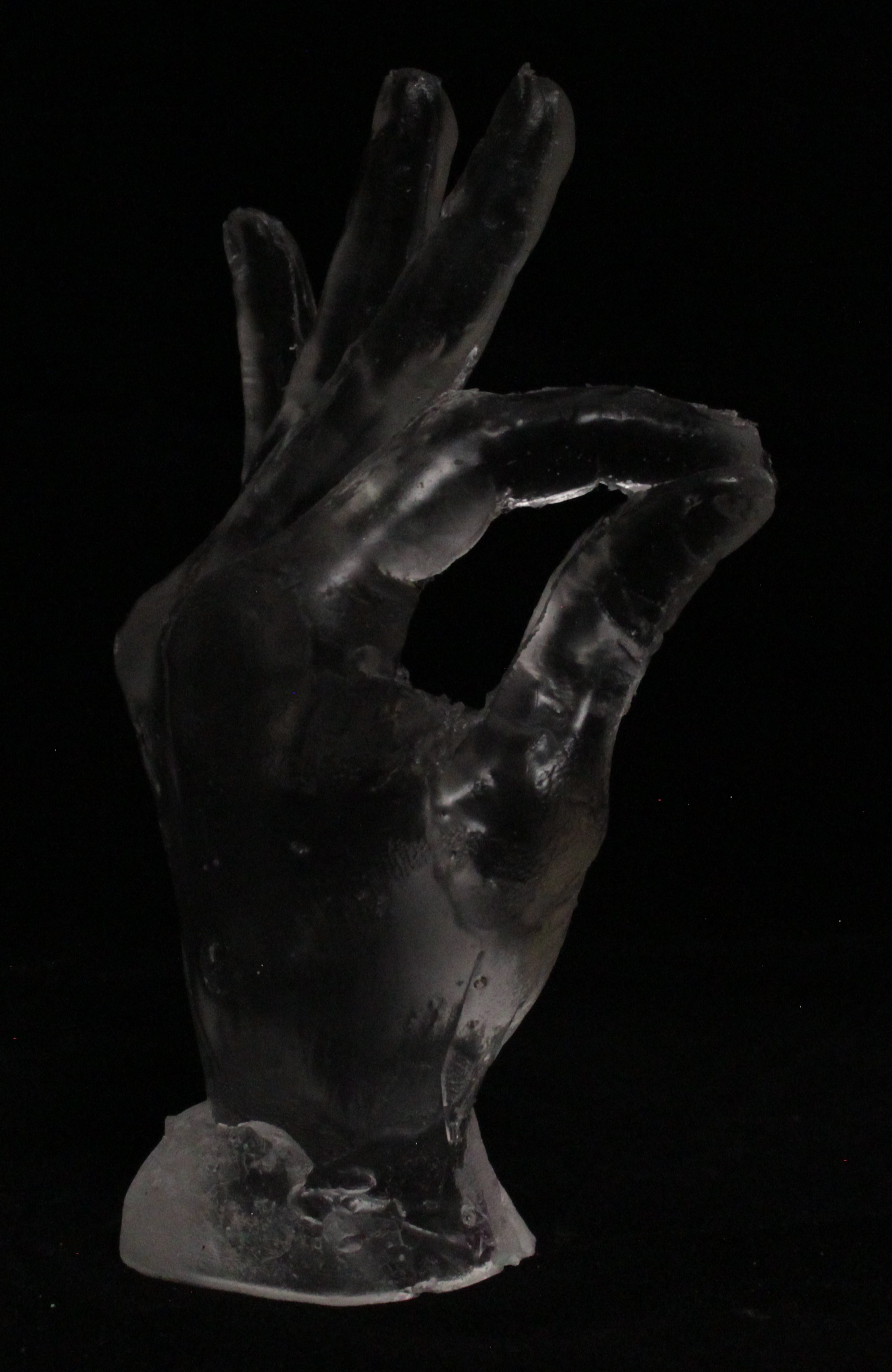 Clear resin cast of female hand