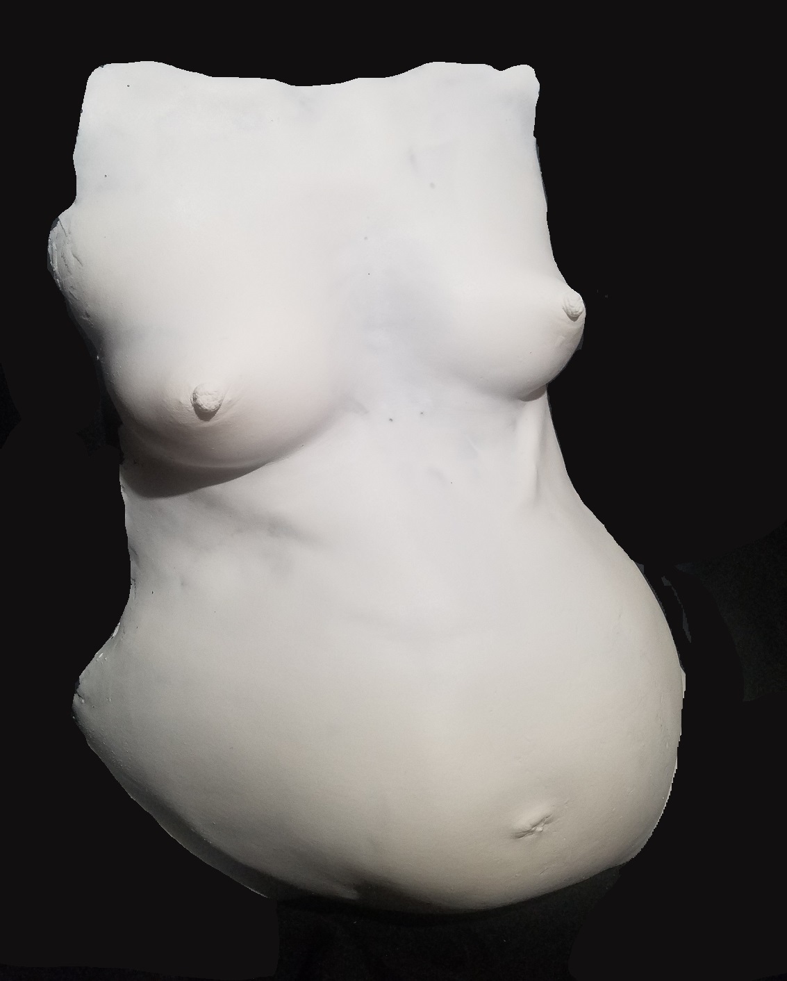 white plastic pregnant breasts and belly