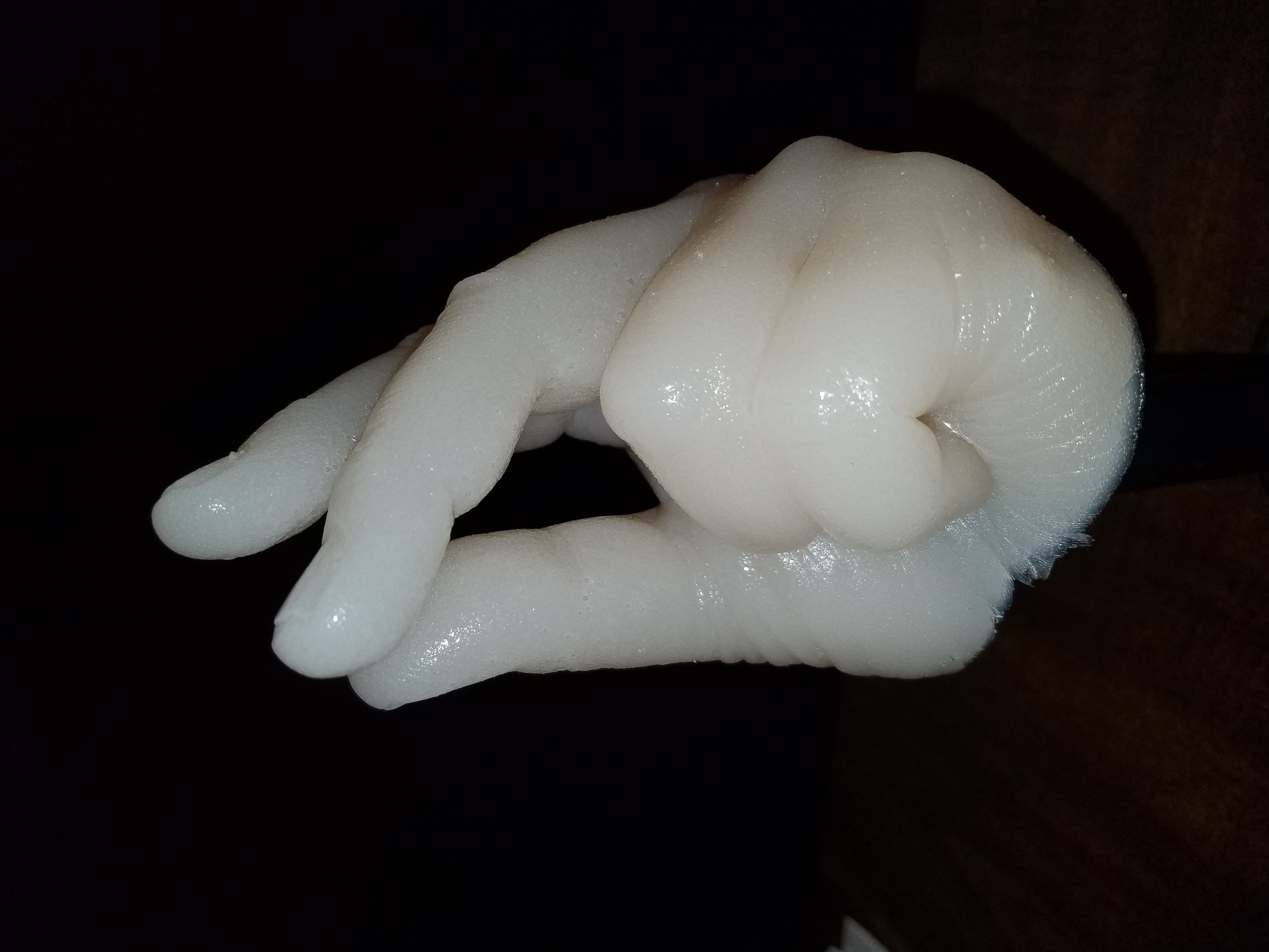 Silicone casting of male hand - fingers posed as though snapping them