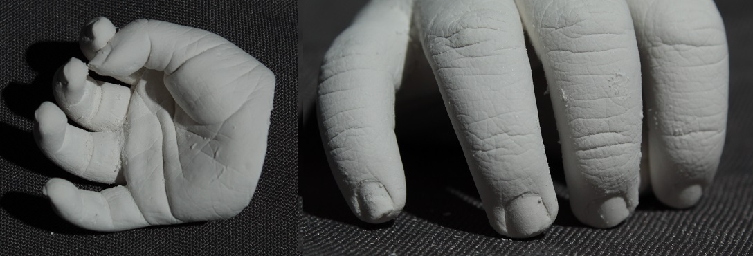 White Plaster casting of Infant's Hand