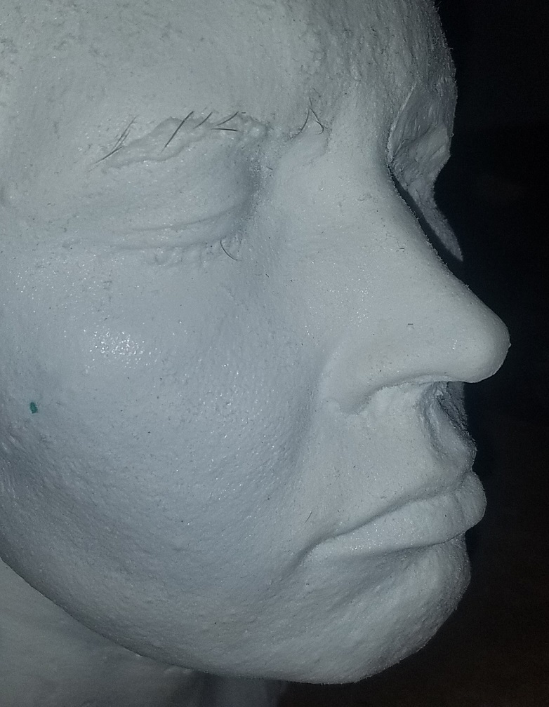 white plastic female head lifecast