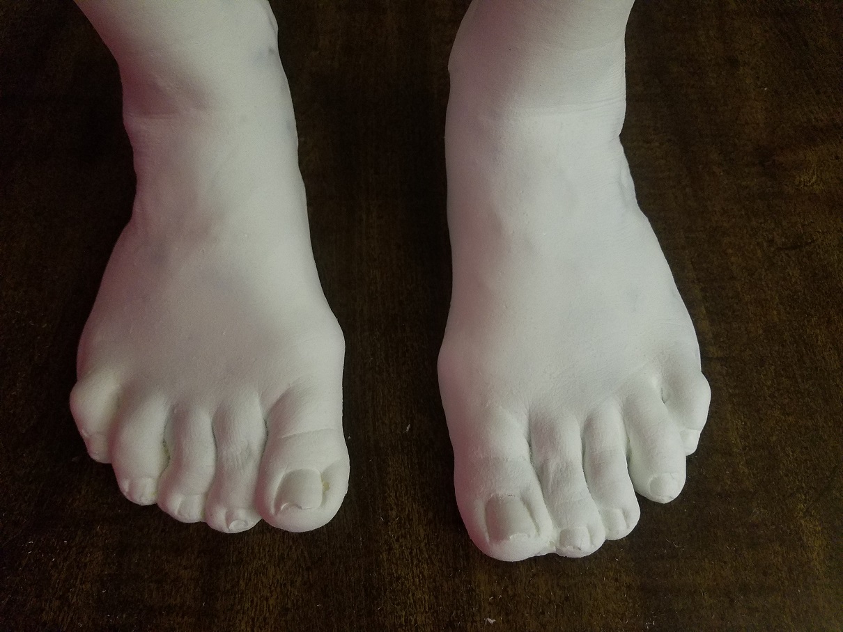 Plaster casting of female feet